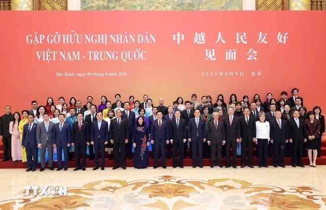 Chủ tịch Quốc hội Vương Đình Huệ dự Gặp gỡ hữu nghị nhân dân Việt Nam-Trung Quốc