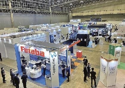 construction related uavs exhibited at drone expo in chiba