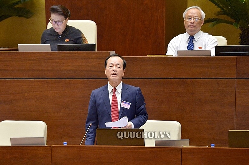Minister Pham Hong Ha answeres questions to National Assembly about social housing
