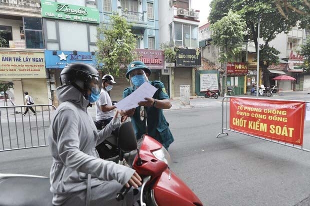 Hà Nội: Người đi đường không cần xuất trình giấy phân công nhiệm vụ, lịch trực