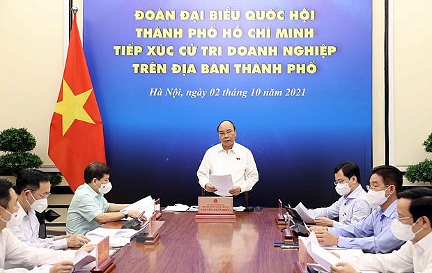 chu tich nuoc nguyen xuan phuc tiep xuc cu tri doanh nghiep tphcm